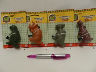Obrázek z Pistolka 8cm plast, stříkací dino 4dr 